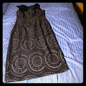 Sleeveless sheath dress, black lace tan underlay